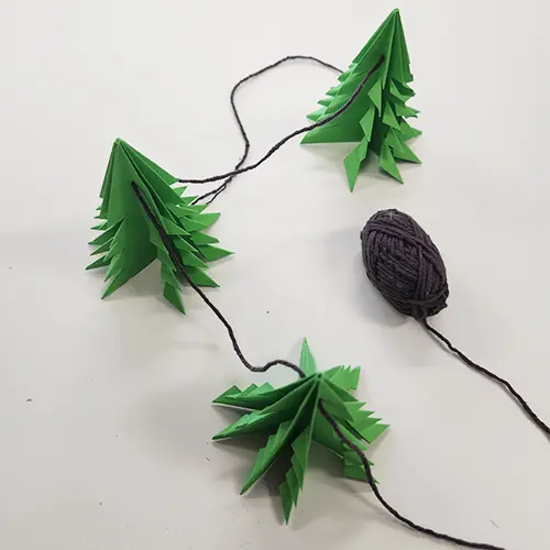 Fabrique tes sapins en origami